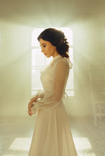 Lady In White Vintage Dress Standing In A Large Spacious Room , Fantastic Shot, Fairytale  , Trendy Toning , Creative Computer Colors
