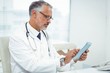 © WavebreakMediaMicro - Doctor using digital tablet