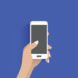 Hand holding smartphone. Simple icon on blue background.