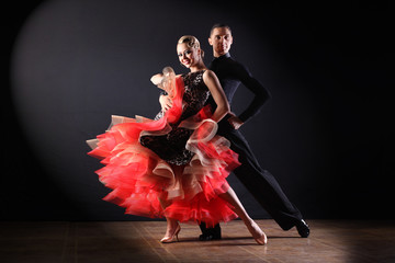 Wall Mural - dancers in ballroom isolated on black background