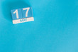 May 17th. Image of may 17 wooden color calendar on blue background.  Spring day, empty space for text.  International Day Against Homophobia, IDAHOBIT