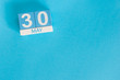 May 30th. Image of may 30 wooden color calendar on blue background.  Spring day, empty space for text.  International or World Press Freedom Day