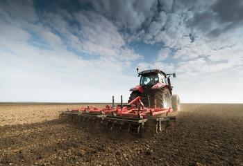 Wall Mural - Tractor preparing land