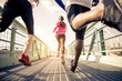 Leinwandbild Motiv Joggers running outdoors