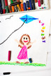 Colorful drawing: Little girl playing with a kite