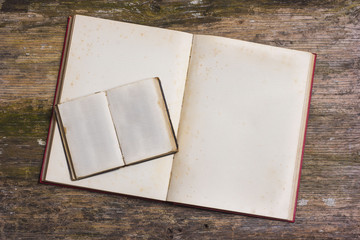 Wall Mural - Open books on wooden table