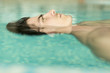 © BGStock72 - Man floating in the pool