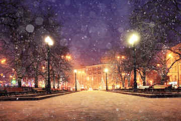 Wall Mural - background blur city evening snow