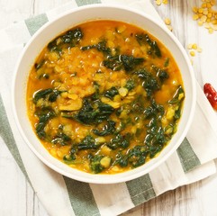 Wall Mural - Dal Indian lentil curry soup with spinach