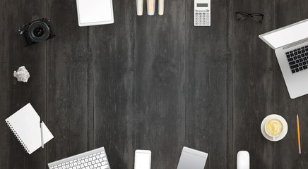 Leinwandbilder - Work desk with free space for text surrounded with a lot of desk accessories. There is a laptop, tablet, phone, camera, headset, mouse, glasses, camera, pens, paper...