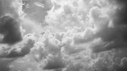 Wall Mural - black and white clouds in the sunset