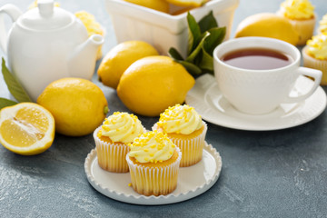 Wall Mural - Lemon cupcakes with bright yellow frosting