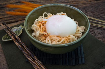 Homemade Quick Ramen Noodles with seasoning chilli and egg on to