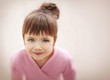 © Africa Studio - Little cute girl in pink leotard sitting on floor at dance studio