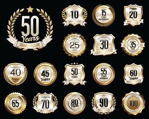 Set of Golden Anniversary Badges. Set of Golden Anniversary Signs.
Gold and White. 