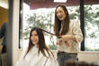 © Monet - Long hair of women are cut hair hairdresser