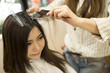 © Monet - Young women are dyed the color of the hair in a beauty salon