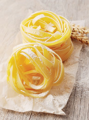 Wall Mural - Pasta tagliatelle with wheat.