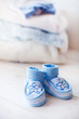  baby shoes for boy on a blue background