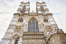 Westminster Abbey Church In London, Facade On Cloudy Sky