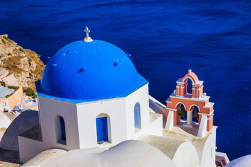 famous blue domes of amazing Santorini. Greece