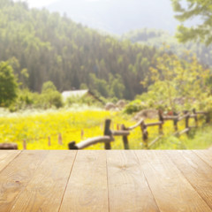 Poster - Wooden table on blurred nature background