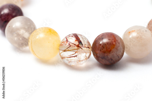 Fotografia, Obraz Close up of Handmade Moonstone, Color stone, stone bead created bracelet, for longlive and lucky