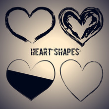 Set Of Four Dark Blue Heart Shapes.
