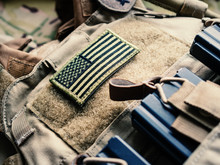 Green U.S. Flag On The Bulletproof Vest