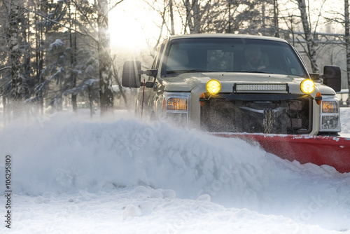 Fotomural Snow plow doing snow removal after a blizzard