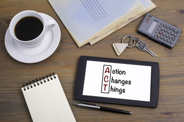 Wall Mural - Action Changes Things (ACT), business concept. Text on tablet de