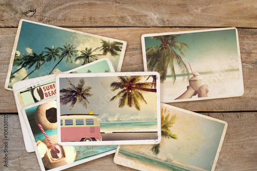 Plakat Summer photo album on wood table. instant photo of polaroid camera - vintage and retro style