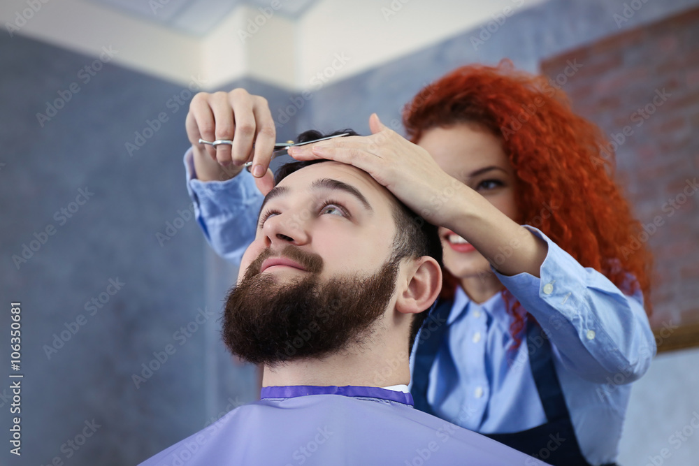 Handsome man visit barber shop