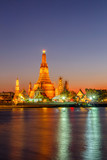 Fototapeta Paryż - Wat Arun Buddhist religious places in twilight time, Bangkok, Thailand