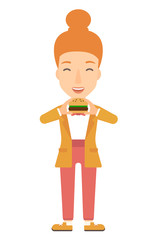 Canvas Print - Woman eating hamburger. 