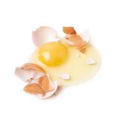 Wall Mural - Cracked raw chicken egg isolated