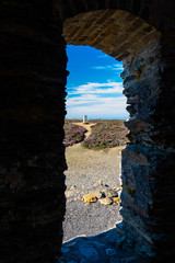 Wall Mural - Trig point seen through arch, Parys Mountain.