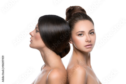 Obraz na plátne Two beautiful girls with perfect skin