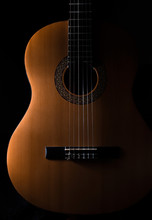 Acoustic Guitar On Black Background