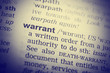 Dictionary definition of the word Warrant . Toned Image