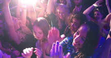 Women And Girls Dancing And Cheering In Club During Party