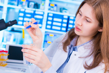 Wall Mural - woman  technician in food quality control laboratory