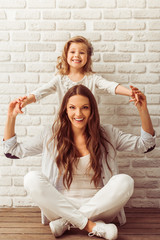 Wall Mural - Beautiful mother and daughter