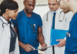 © Flamingo Images - Group of multiracial doctors