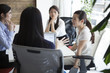 © Monet - Four of the women, have a planning meeting at the office