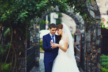 gorgeous beautiful happy young Caucasian couple posing in the ga