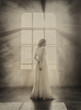 © kharchenkoirina - Lady in white vintage dress standing in a large spacious room , fantastic shot, fairytale princess turned into smoke , trendy toning , creative computer colors