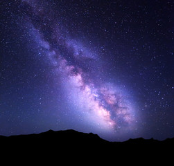 Wall Mural - mountain landscape with milky way. night sky with stars at summer.