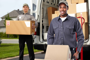 Wall Mural - Delivery man near shipping truck.