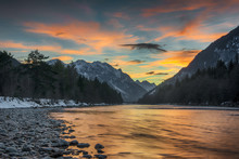 Wild Alpine River Lech At Sunset Between Alpine Mountains